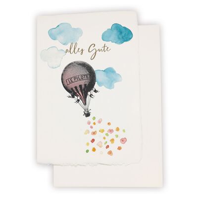 Tarjeta de papel hecha a mano "Alles Gute" con un globo nostálgico