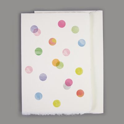 Handmade paper card with delicate confetti, versatile