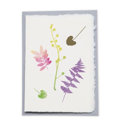 Gift card made of handmade paper with plant motifs and leaf in gold