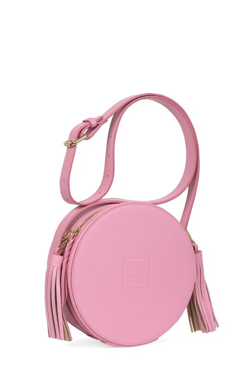 Bandolera de mujer tipo circle bag rosa con borlas bicolor en nude Leandra.