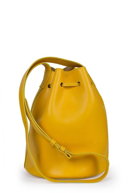 Bolso de piel tipo saco o Bucket Bag amarillo mostaza con bolsillo extraíble y borlas bicolor Leandra yellow