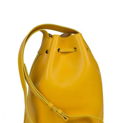 Bolso de piel tipo saco o Bucket Bag amarillo mostaza con bolsillo extraíble y borlas bicolor Leandra yellow