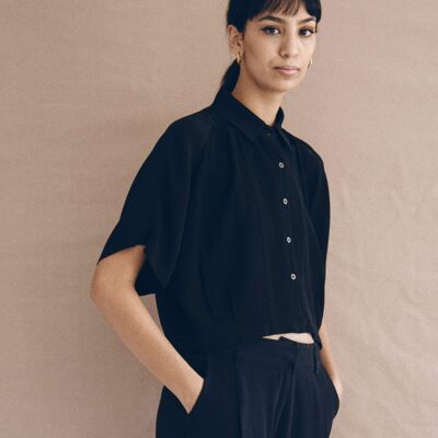 MAXIME / Black shirt in textured fabric with cutouts