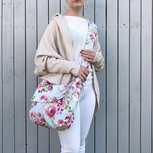 Rose on blue print floral hobo crossbody bag.