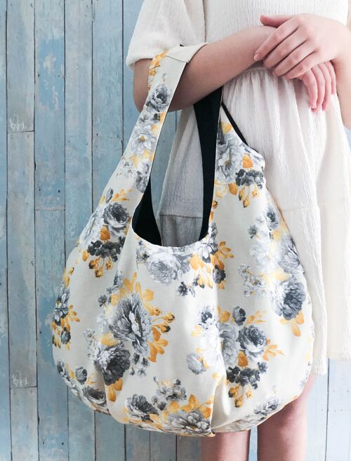 Black, yellow roses on cream handmade large fabric hobo handbag.