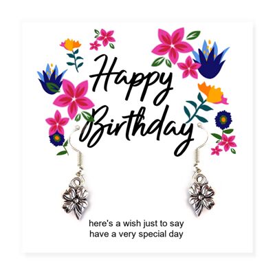 Boucles d'oreilles fleur joyeux anniversaire sur carte de message