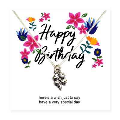 Collier de fleurs de joyeux anniversaire sur la carte de message