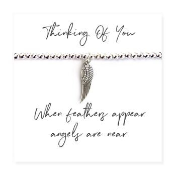 Bracelet de perles d'argent plume d'ange sur carte de message 1
