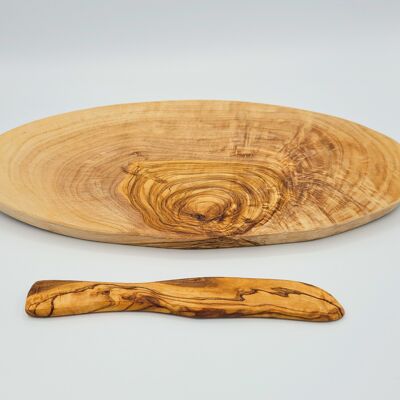 Oval olive wood cutting board with wooden knife
