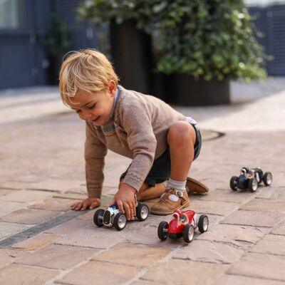 Juguete infantil de coche de carreras rojo