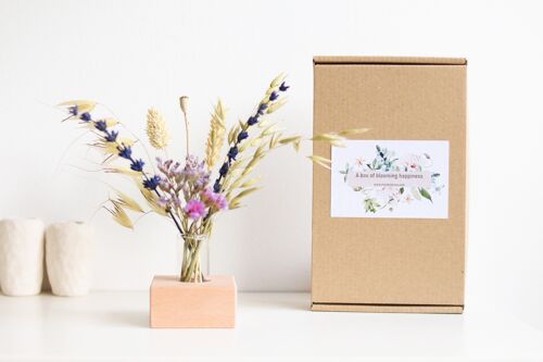 Dried flowers with wooden holder