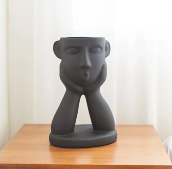 Vase en céramique visage à deux mains 4