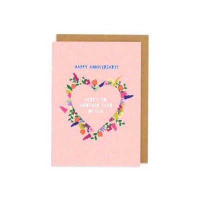 Tarjeta de felicitaciones de feliz aniversario con corazón floral