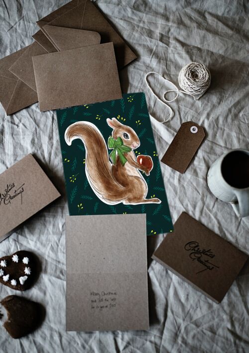 Weihnachtspostkarte Winterschlaf Eichhörnchen