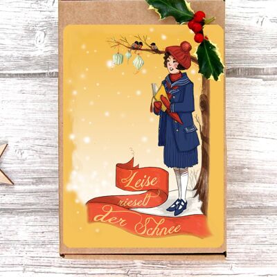 Vintage Christmas postcard. The snow is falling softly