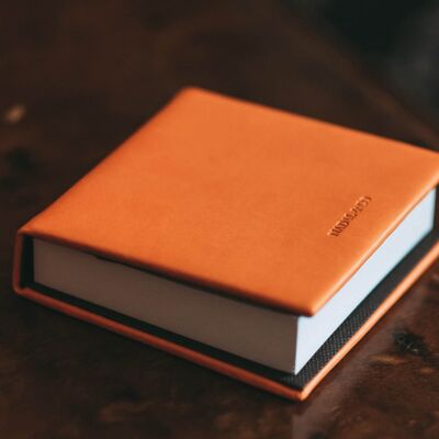 Orange imitation leather note holder