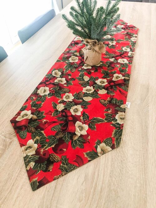 Christmas table runner. Handmade table runner with Christmas floral patterns.