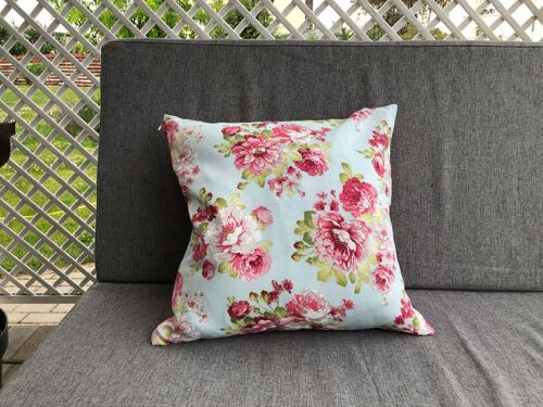 Farmhouse floral pillow cover for indoor and outdoor use.