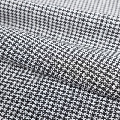 White houndstooth jacquard knit fabric