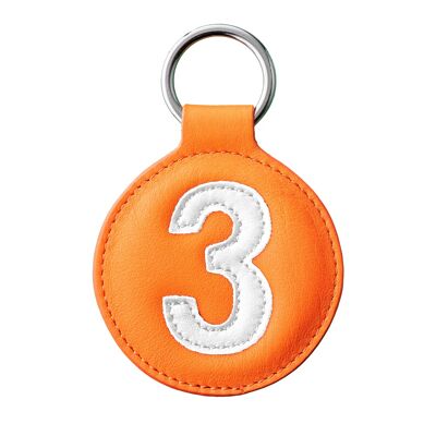 Porte clé n°3 blanc fond orange