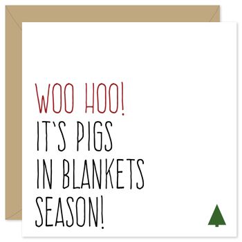Carte de Noël de cochons dans des couvertures 1