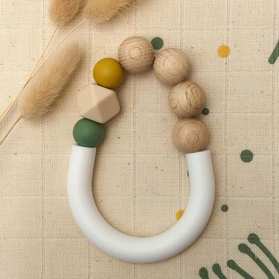 Yellow and green teething ring