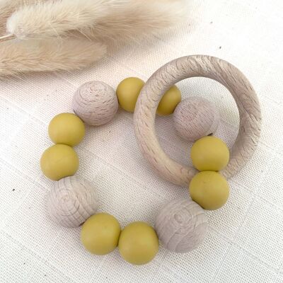 Yellow teething rattle in silicone and beech wood