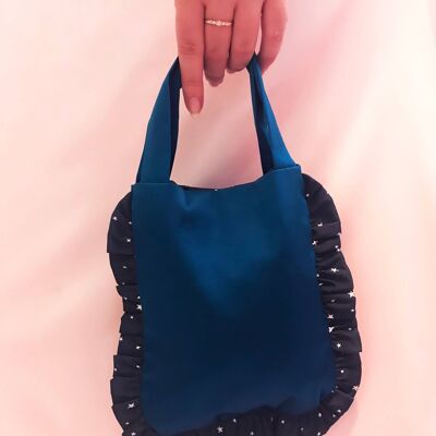 Bolso zafiro verde azulado con estampado de estrellas azul marino con volante y cadena transparente