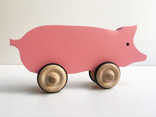 Hubert le cochon en bois à roulettes