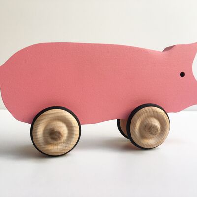 Hubert the wooden pig on wheels