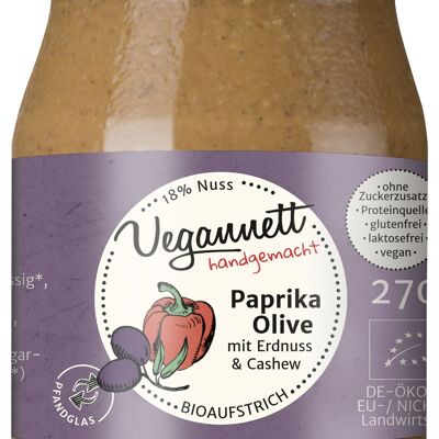 Paprika-olive spalmabili biologiche con arachidi e anacardi senza zuccheri aggiunti in un bicchiere a rendere (deposito)!