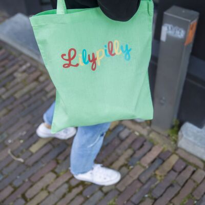Shopper in cotone verde con grafica Lilypilly stampata
