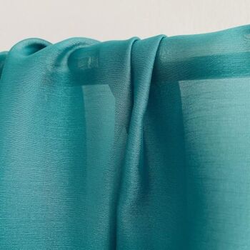 Tissu mousseline turquoise cationique