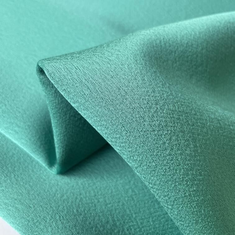 Tessuto crepe acetato turchese