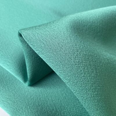 Turquoise acetate crepe fabric