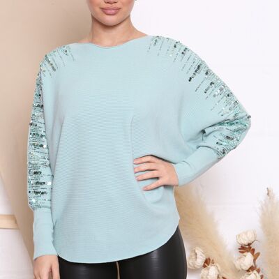 maglione menta con ali di pipistrello e paillettes