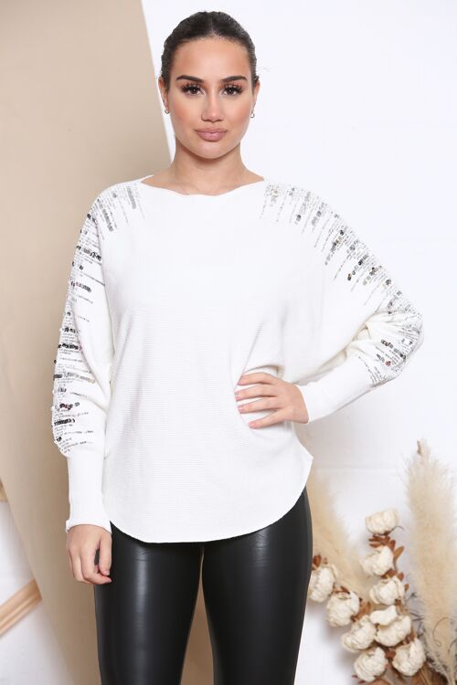 white bat wing jumper with sequins
