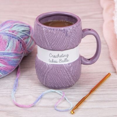 Le crochet prend la tasse au crochet de Balls