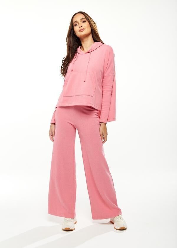 Liquorish Felpa oversize con cappuccio e tasca frontale in rosa - S